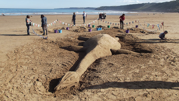 Newsletter Number 90 - A beached plesiosaur basking on the sand in sunny Scarborough