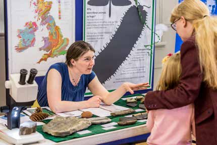 Engaging with the public at an exhibit about the Carboniferous